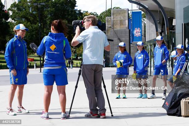 Five young fans watch on as Alex Blackwell talks to the media during a Southern Stars training session at Melbourne Cricket Ground on February 18,...