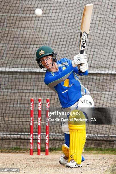 Ellyse Villani hits the ball during a Southern Stars training session at Melbourne Cricket Ground on February 18, 2017 in Melbourne, Australia.