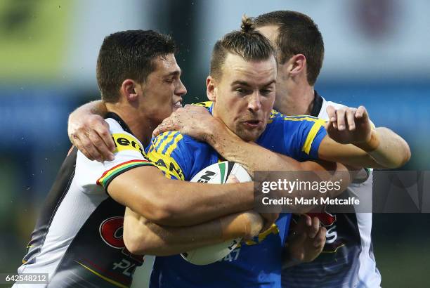 Clinton Gutherson of the Eels is tackled during the NRL Trial match between the Penrith Panthers and Parramatta Eels at Pepper Stadium on February...