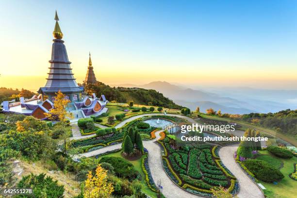 landscape of two pagoda at the inthanon mountain at sunset, chiang mai, thailand. - tailandia foto e immagini stock