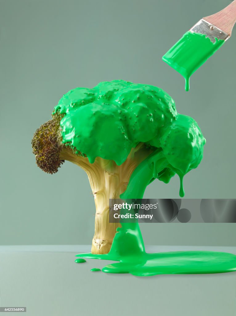 Stalk of old Broccoli being painted green