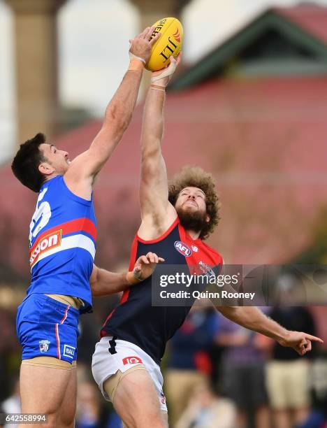 Tom Campbell of the Bulldogs and Jake Spencer of the Demons compete in the ruck during the 2017 JLT Community Series match between the Western...