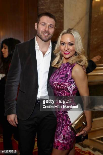 Kristina Rihanoff and Ben Cohen attend the Julien MacDonald show during the London Fashion Week February 2017 collections on February 18, 2017 in...