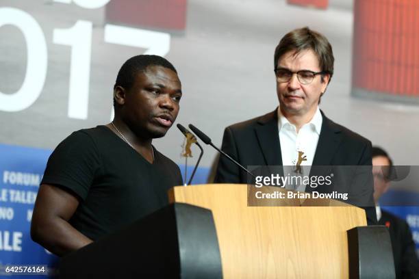 Congolese director Dieudo Hamadi and President of the ecumenical jury Charles Martig speak at the awards of the Independent Juries press conference...