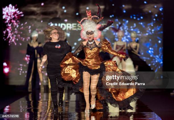 Actress Victoria Abril and designer Nuria Sarda walk the runway at the Andres Sarda show during the Mercedes-Benz Madrid Fashion Week Autumn/Winter...