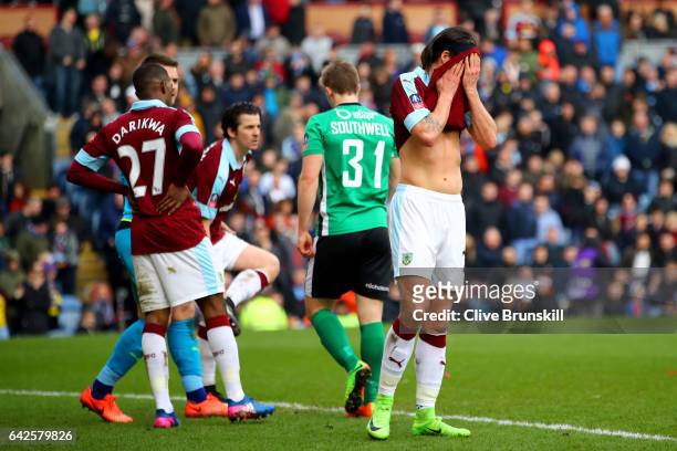 Tendayi Darikwa of Burnley and George Boyd of Burnley are dejected are Lincoln City score during The Emirates FA Cup Fifth Round match between...