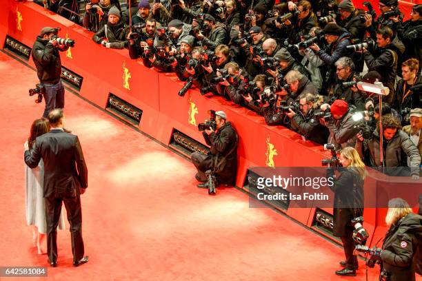 German actress Iris Berben and her boyfriend Heiko Kiesow attend the 'Logan' premiere during the 67th Berlinale International Film Festival Berlin at...