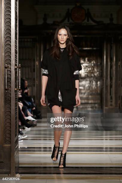 Model walks the runway at the Dubai Design & Fashion Council show at Fashion Scout during the London Fashion Week February 2017 collections on...