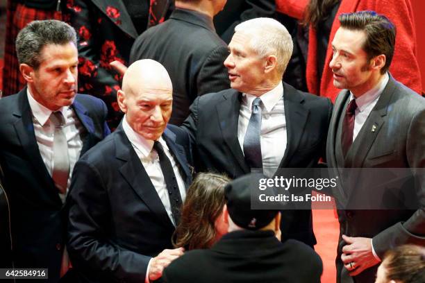 Producer Simon Kinberg, british actor Patrick Stewart, producer Hutch Parker and australian actor Hugh Jackman attend the 'Logan' premiere during the...