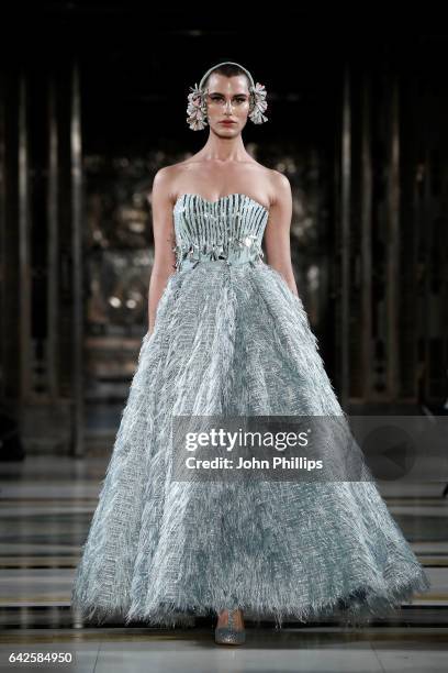 Model walks the runway at the Dubai Design & Fashion Council show at Fashion Scout during the London Fashion Week February 2017 collections on...