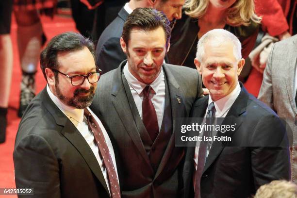 Director James Mangold, australian actor Hugh Jackman and producer Hutch Parker attend the 'Logan' premiere during the 67th Berlinale International...