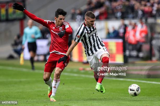 Alfredo Morales and Ante Rebic of Frankfurt battle for the ball during the Bundesliga match between Eintracht Frankfurt and FC Ingolstadt 04 at...