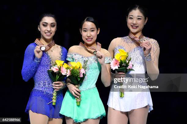 Gabrielle Daleman of Canada and Mai Mihara of Japan and Mirai Nagasu United States pose on the podium during the medals ceremony of the Ladies...