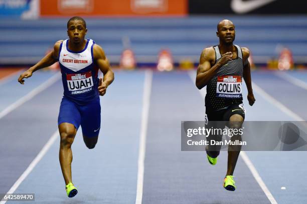 Chijindu Ujah and Kim Collins of St Kitts and Nevis compete in the Mens 60 metres heats during the Muller Indoor Grand Prix 2017 at Barclaycard...