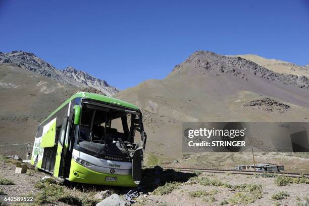 View of the bus that overturned, leaving at least 19 of the 40 passengers dead and more than 20 injured, near the town of Uspallata in the western...