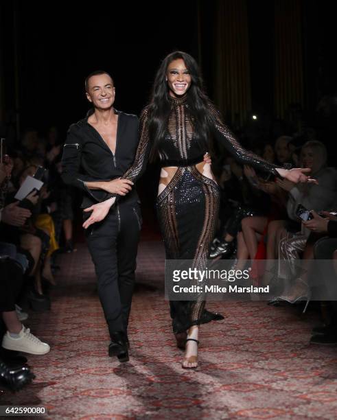 Winnie Harlow and Julien Macdonald walk at the Julien Macdonald runway during the London Fashion Week February 2017 collections on February 18, 2017...