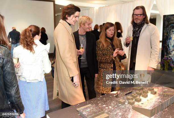 Creative director Dominic Jones speaks about the jewellery to clients and media during the Astley Clarke AW17 Presentation during London Fashion Week...