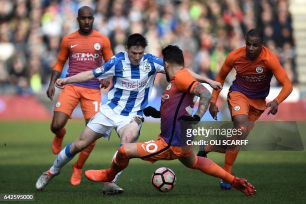 Huddersfield Town's English midfielder Joe Lolley vies with Manchester City's Argentinian defender Nicolas Otamendi during the English FA Cup fifth...