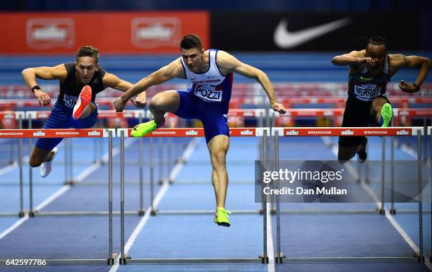 Avid King of Great Britain, Andrew Pozzi of Great Britain and Aries Merritt of the United States compete in the Mens 60 metres hurdles final ahead...