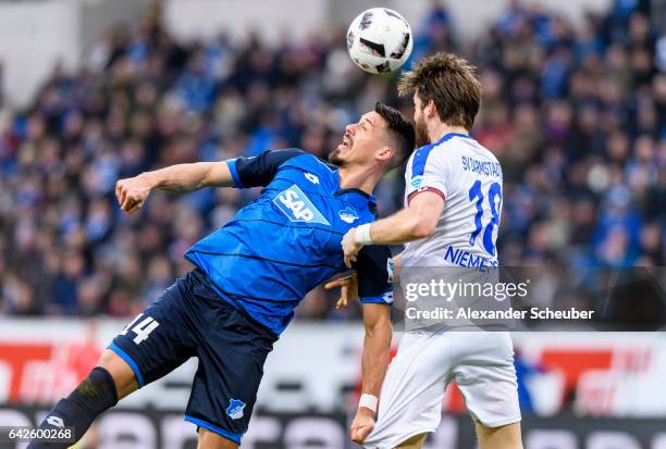 Peter Niemeyer of Darmstadt challenges Sandro Wagner of Hoffenheim during the Bundesliga match between TSG 1899 Hoffenheim and SV Darmstadt 98 at...