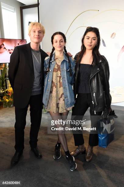 Creative director Dominic Jones poses with guests during the Astley Clarke AW17 Presentation during London Fashion Week at Savoy Place on February...