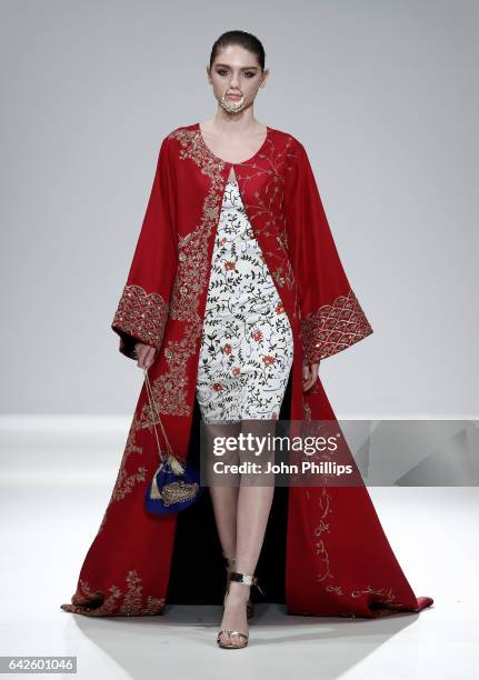 Model walks the runway wearing a design by The Pinktree Company at the Fashion DNA Pakistan show at Fashion Scout during the London Fashion Week...