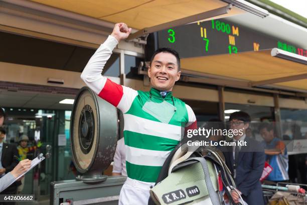 Jockey Kanichiro Fujii celebrates after riding Japanese runner Chrysolite wins the Race 10 The Keeneland Korea Cup at Seoul Racecourse on September...