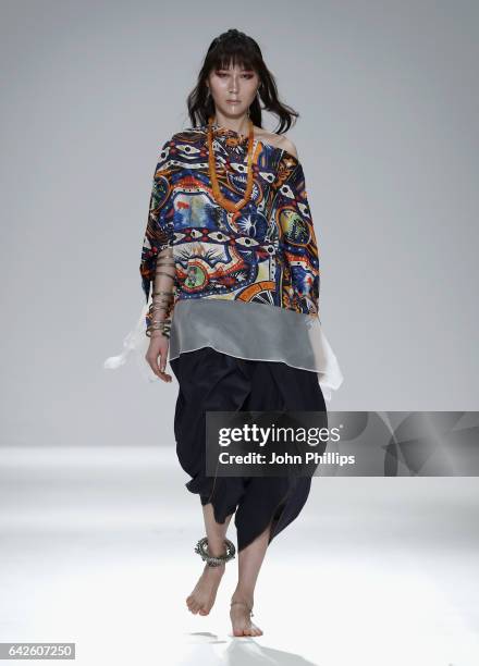 Model walks the runway wearing a design by Gulabo by Maheen Khan at the Fashion DNA Pakistan show at Fashion Scout during the London Fashion Week...