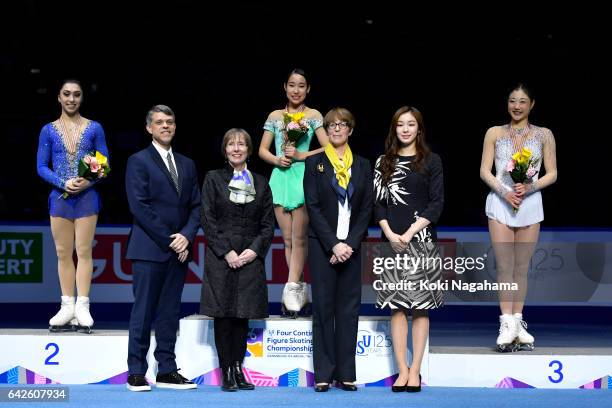 Second place winner Gabrielle Daleman of Canada, first place winner Mai Mihara of Japan and third place winner Mirai Nagasu of United States pose...