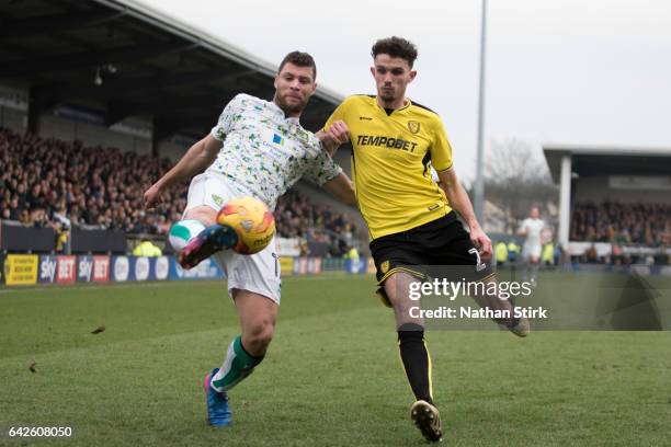 Yanic Wildschut of Norwich City and Tom Flanagan of Burton Albion in action during the Sky Bet Championship match between Burton Albion and Norwich...