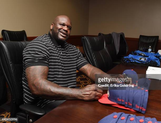 Shaquille O'Neal signs autographs for the Boys & Girls Club of Southeast Louisiana with American Express at the NBA Store for NBA All-Star on...