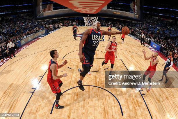 Myles Turner of the USA Team grabs the rebound against the World Team during the BBVA Compass Rising Stars Challenge as part of 2017 All-Star Weekend...