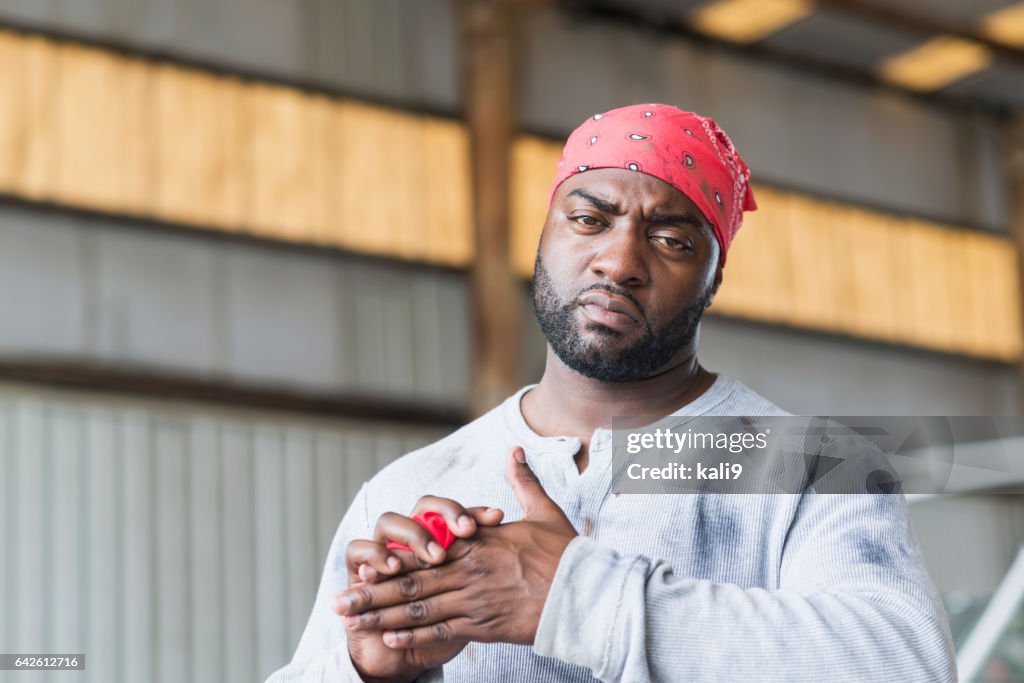 Someone Getting A Rag Black Man Wearing Do Rag And Grimy Shirt High-Res Stock Photo - Getty ...