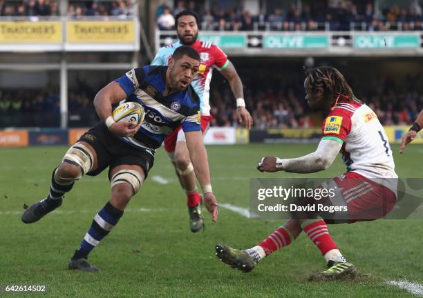 Toby Faletau of Bath takes on Marland Yarde during the Aviva Premiership match between Bath Rugby and Harlequins at the Recreation Ground on February...