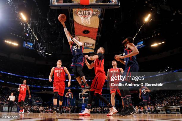 Devin Booker of the USA Team drives to the basket against the World Team during the BBVA Compass Rising Stars Challenge as part of 2017 All-Star...