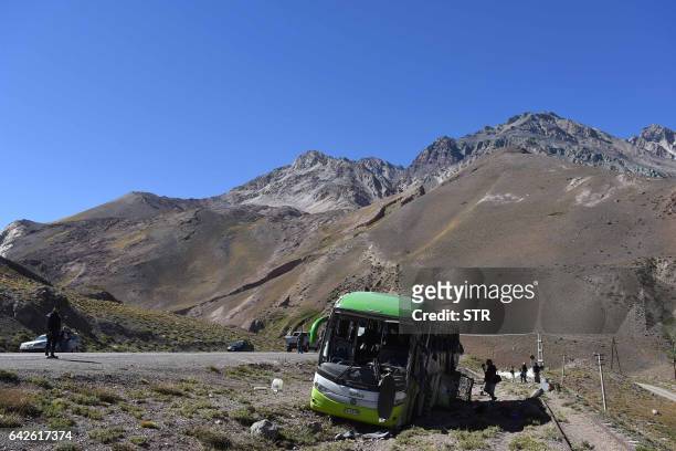 View of the bus that overturned, leaving at least 19 of the 40 passengers dead and more than 20 injured, near the town of Uspallata in the western...