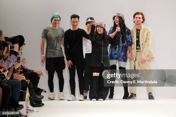 Designers salute the crowd at the Dan La Vie show at Fashion Scout during the London Fashion Week February 2017 collections on February 18, 2017 in...