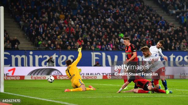 Aaron Hunt of Hamburg scores his goal during the Bundesliga match between Hamburger SV and SC Freiburg at Volksparkstadion on February 18, 2017 in...