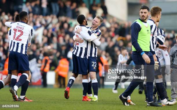 Shaun Cummings and Aiden O'Brian of Millwall celebrate after The Emirates FA Cup Fifth Round tie between Millwall and Leicester City at The Den on...