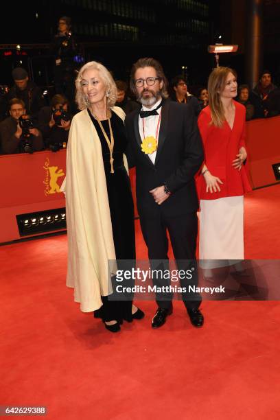 Jury members Dora Bouchoucha Fourati and Olafur Eliasson arrives for the closing ceremony of the 67th Berlinale International Film Festival Berlin at...