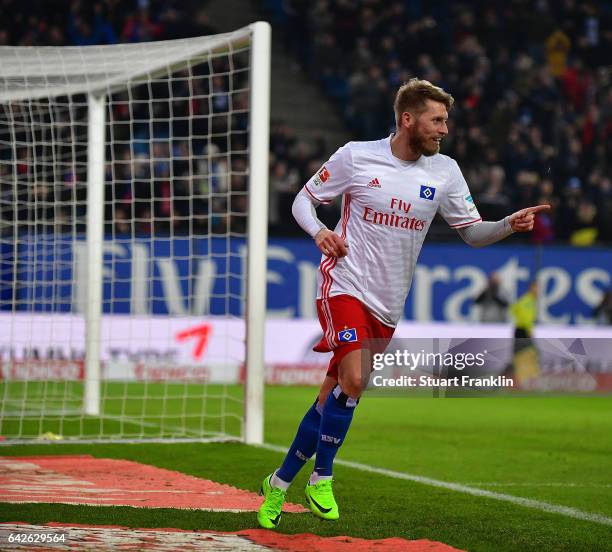 Aaron Hunt of Hamburg celebrates scoring his goal during the Bundesliga match between Hamburger SV and SC Freiburg at Volksparkstadion on February...