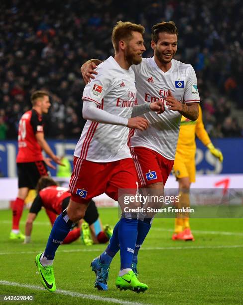 Aaron Hunt of Hamburg celebrates scoring his goal with Dennis Diekmeier during the Bundesliga match between Hamburger SV and SC Freiburg at...