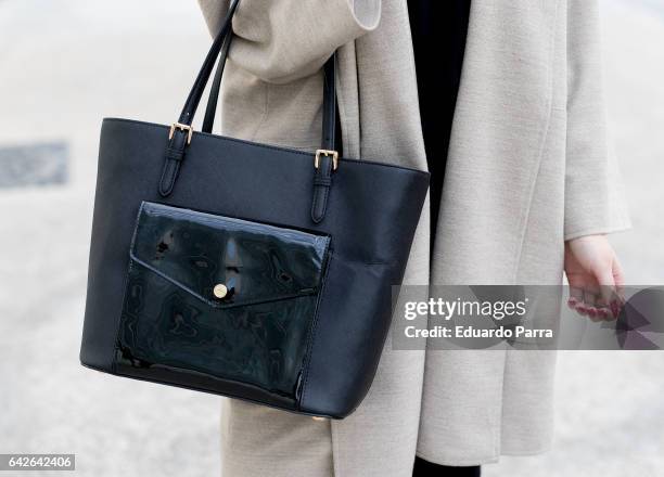 Ainhoa wears H&M trousers, Zara shirt, Zara jacket, Michael Kors handbag and Pull & Bear shoes during the Mercedes Benz Fashion Week Autumn / Winter...