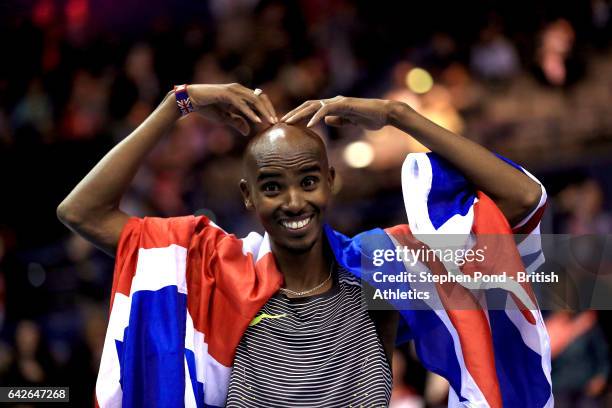 Sir Mo Farah celebrates winning the mens 5000m during the Muller Indoor Grand Prix 2017 at the Barclaycard Arena on February 18, 2017 in Birmingham,...