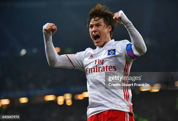 Gotoku Sakai of Hamburg celebrates his teams second goal during the Bundesliga match between Hamburger SV and SC Freiburg at Volksparkstadion on...