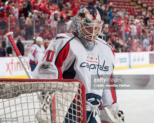 Braden Holtby of the Washington Capitals skates in warm-ups prior to an NHL game against the Detroit Red Wings at Joe Louis Arena on February 18,...