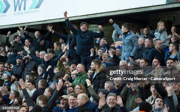 Millwall fans celebrate their sides victory during the Emirates FA Cup Fifth Round match between Millwall v Leicester City at The Den on February 18,...