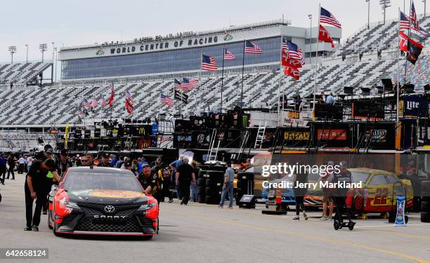 The car of Martin Truex Jr., driver of the Bass Pro Shops/TRACKER BOATS Toyota, goes through in spection during practice for the Monster Energy...