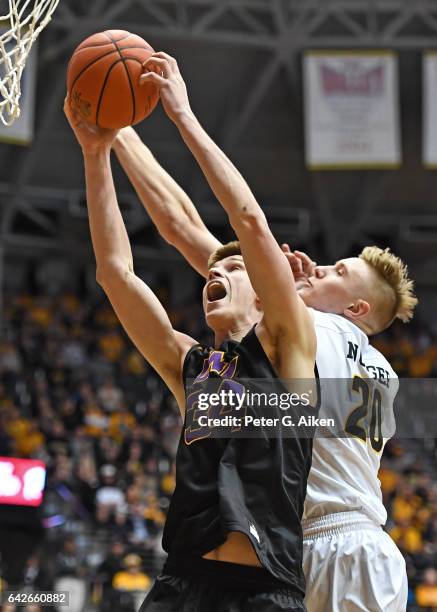 Forward Luke McDonnell of the Northern Iowa Panthers goes up for a rebound against forward Rauno Nurger of the Wichita State Shockers during the...