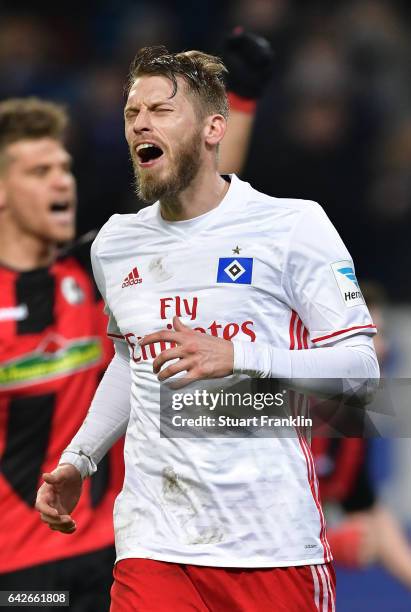 Aaron Hunt of Hamburg reacst after missing the penalty during the Bundesliga match between Hamburger SV and SC Freiburg at Volksparkstadion on...